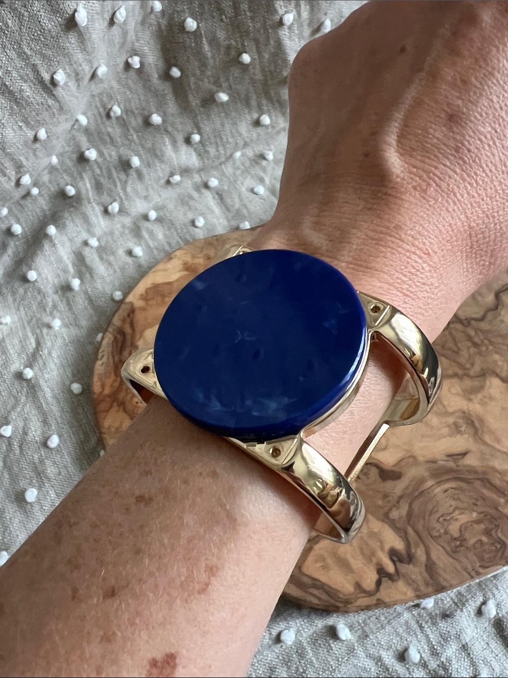 Gold Metal Cuff Bracelet with Navy Blue Disc